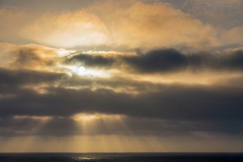 Photo picture of Sunset through coastal fog on the Big Sur coast, Monterey County, California