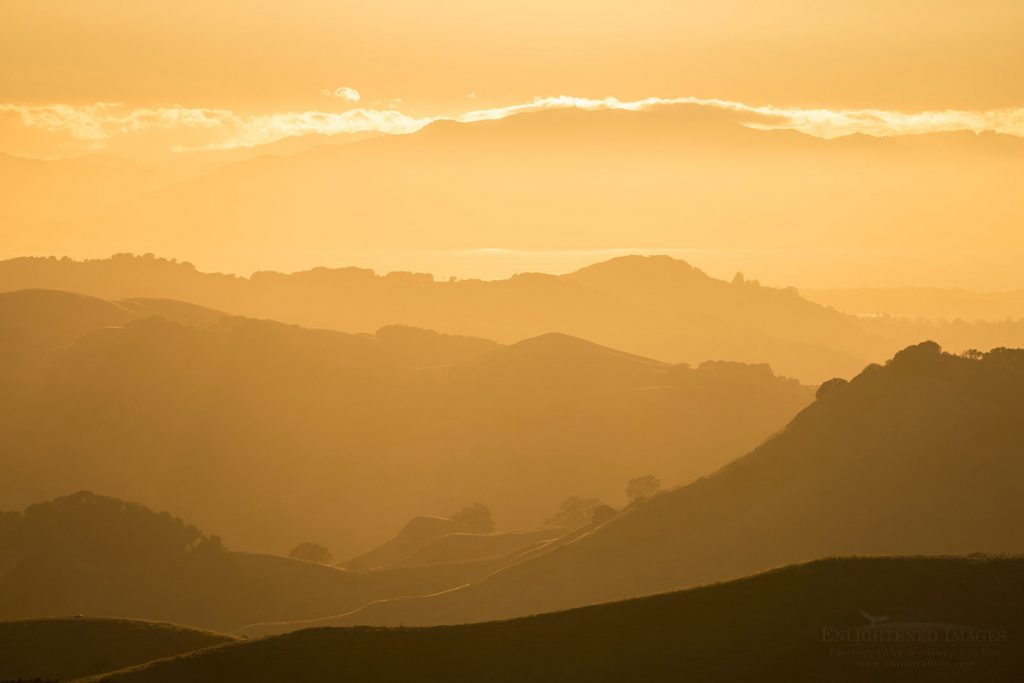 Photo picture of East Bay hills at sunset looking across the San Francisco Bay toward Marin County, California