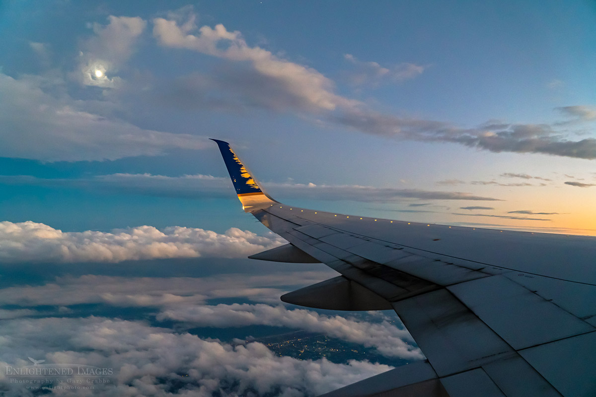 Photo Picture of Moonlight and clouds on evening takeoff out of JFK International Airport, New York