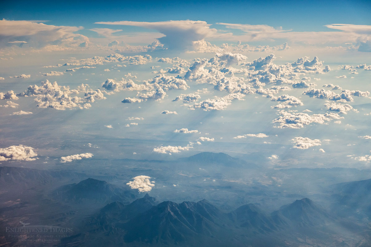 Photo picture of Aerial view of distant thunderstorm clouds over the southwest US.